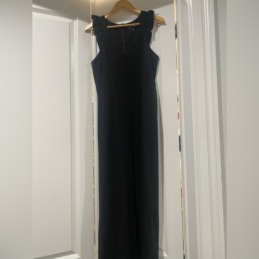 Black jumpsuit ruffle straps.Worn once. Great condition